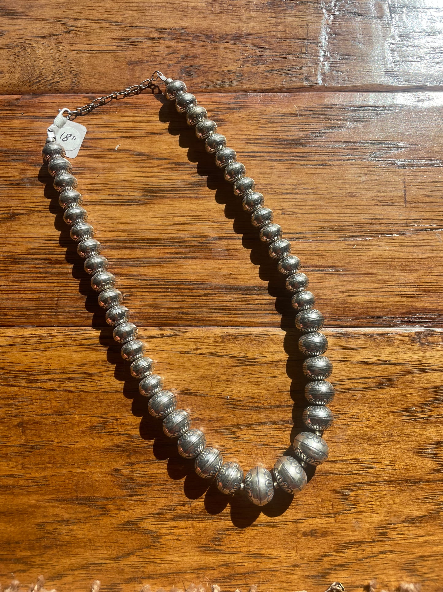 18” Flower Stamped Graduated Navajo Pearls
